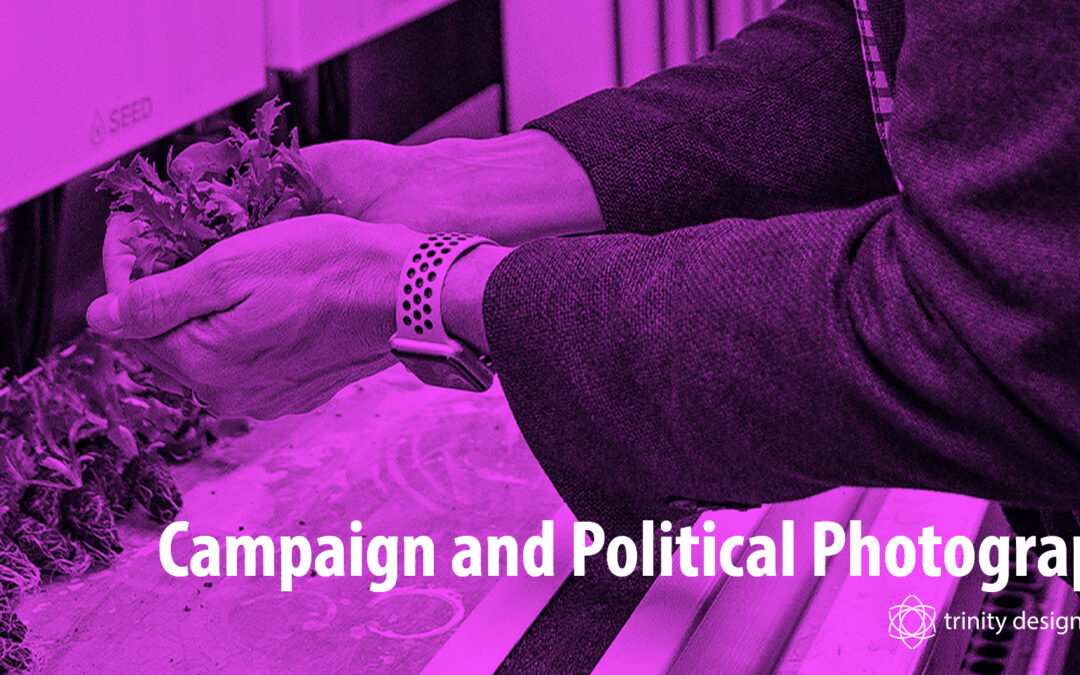 Campaign and Political Photography title with hands holding lettuce in a grow area